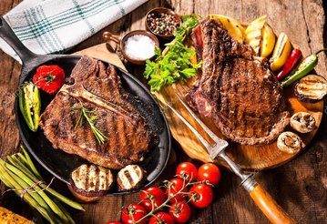depositphotos_74070105-stock-photo-beef-steaks-with-grilled-vegetables